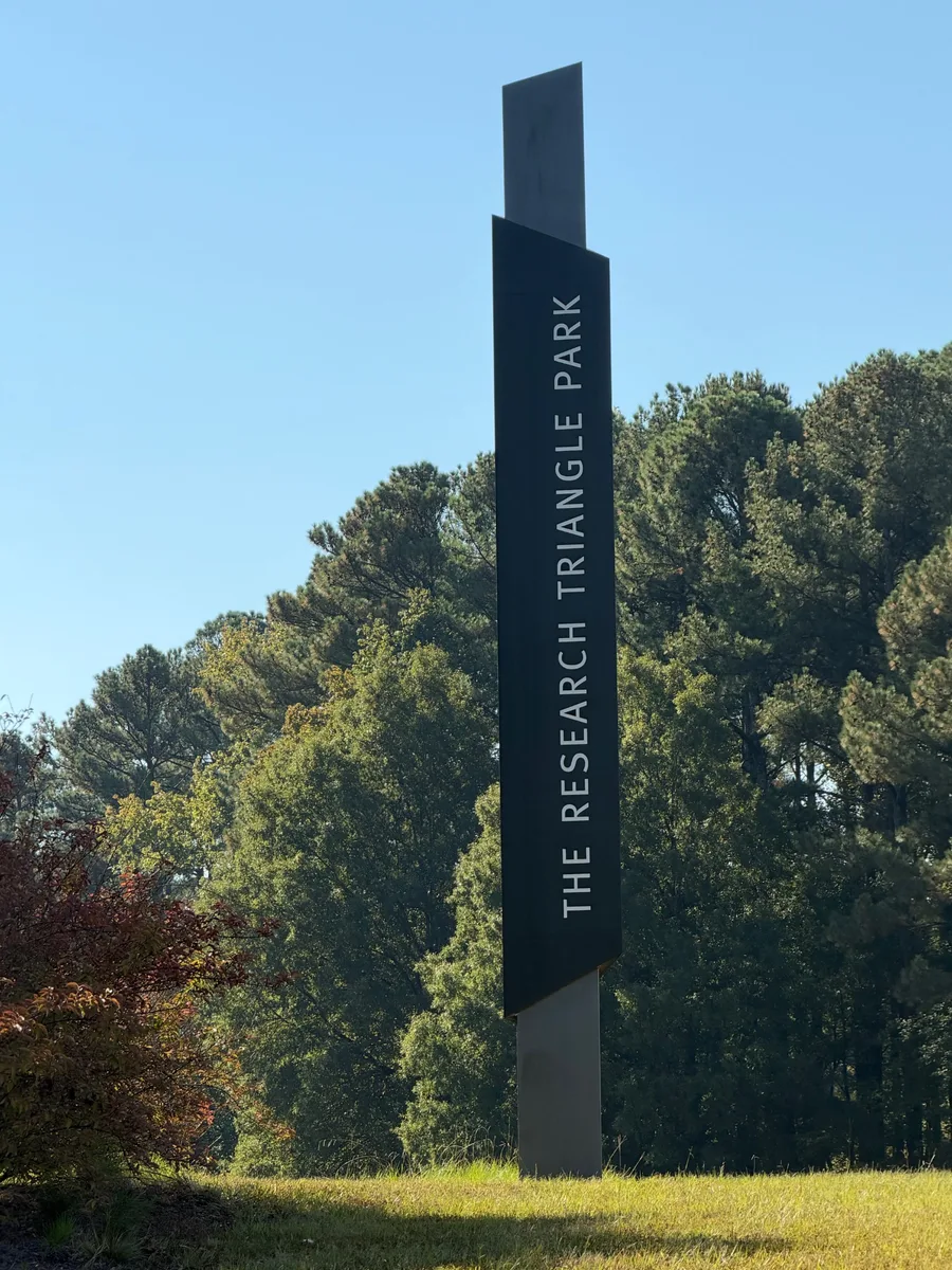 Research Triangle Park entrance monument on TW Alexander Drive, a tall sign reading Research Triangle Park